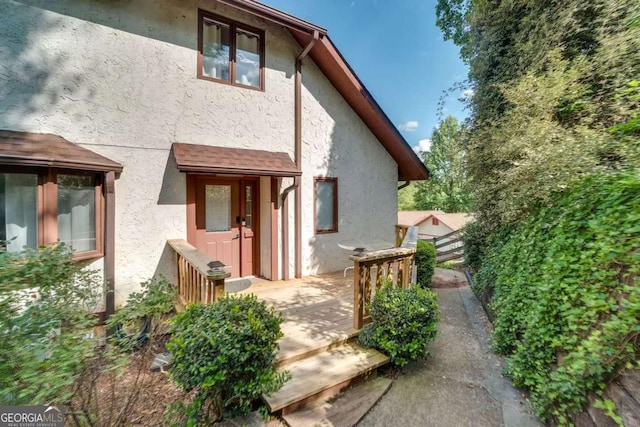 327 Brucken Strasse Unit 311, Helen, GA 30545 - view of exterior entry featuring stucco siding