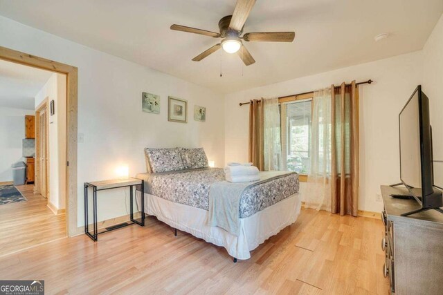 327 Brucken Strasse Unit 311, Helen, GA 30545 - bedroom featuring light wood-style floors and a ceiling fan