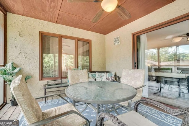 327 Brucken Strasse Unit 311, Helen, GA 30545 - sunroom / solarium featuring a ceiling fan and outdoor dining area