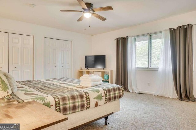 327 Brucken Strasse Unit 311, Helen, GA 30545 - carpeted bedroom featuring two closets and ceiling fan