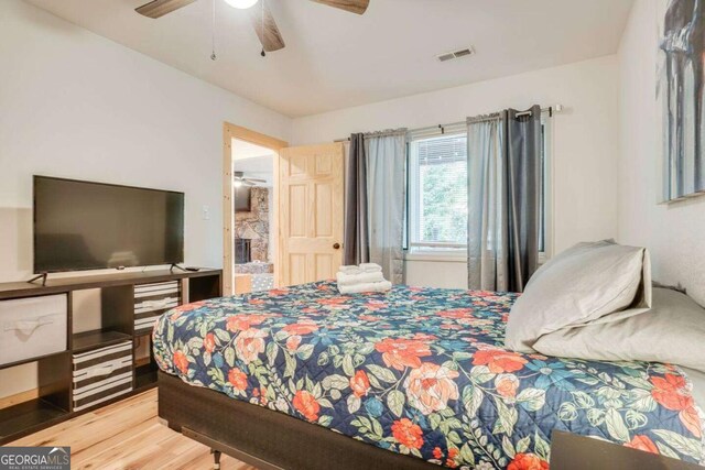 327 Brucken Strasse Unit 311, Helen, GA 30545 - bedroom with wood finished floors and ceiling fan