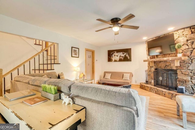 327 Brucken Strasse Unit 311, Helen, GA 30545 - living room with a ceiling fan, stairs, wood finished floors, a stone fireplace, and recessed lighting