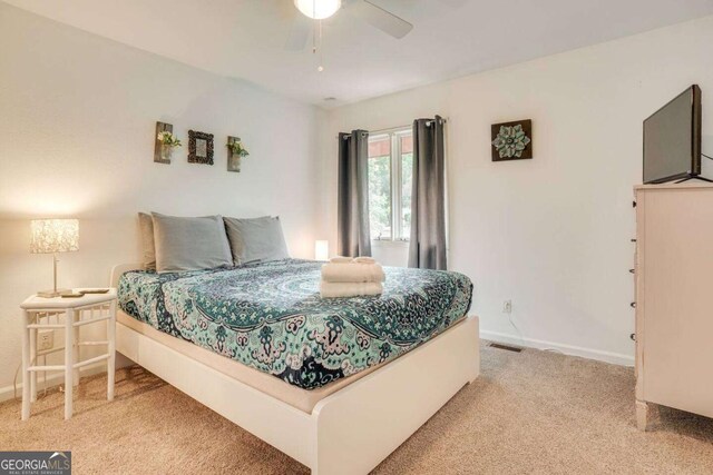 327 Brucken Strasse Unit 311, Helen, GA 30545 - bedroom featuring light carpet and ceiling fan