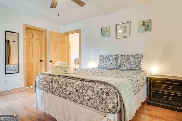 327 Brucken Strasse Unit 311, Helen, GA 30545 - bedroom with wood finished floors and ceiling fan