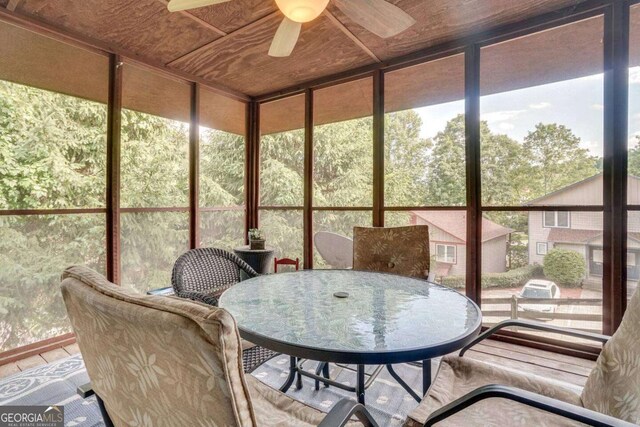 327 Brucken Strasse Unit 311, Helen, GA 30545 - sunroom with ceiling fan, outdoor dining area, and healthy amount of natural light