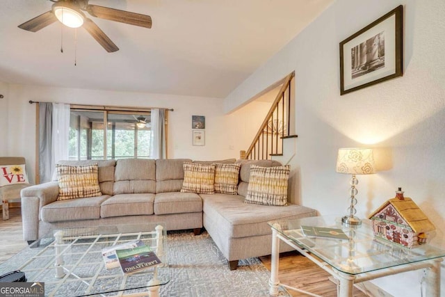 327 Brucken Strasse Unit 311, Helen, GA 30545 - living room featuring a ceiling fan, wood finished floors, and stairs
