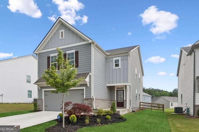 109 Grand Hickory Way, Dawsonville, GA 30534 - view of front of home with board and batten siding, driveway, a garage, and brick siding