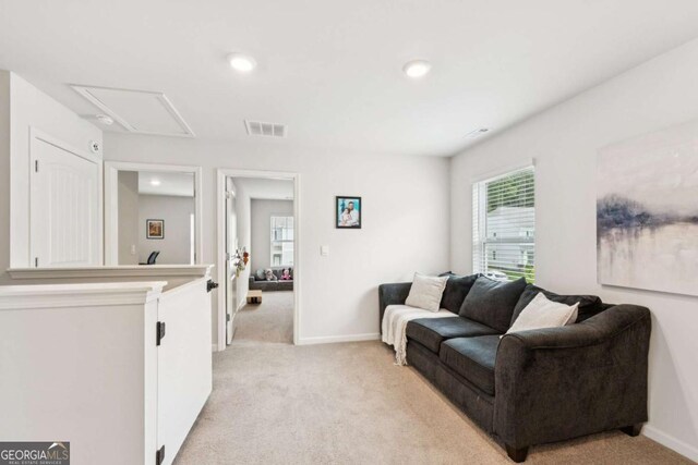 109 Grand Hickory Way, Dawsonville, GA 30534 - living area with light carpet, attic access, and recessed lighting