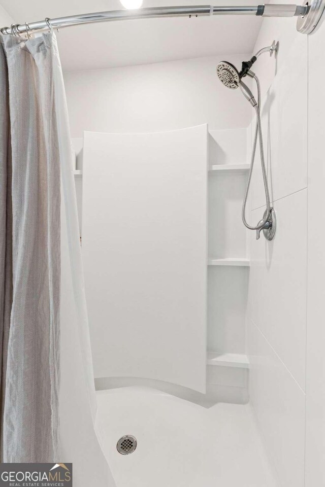 109 Grand Hickory Way, Dawsonville, GA 30534 - bathroom with a shower stall