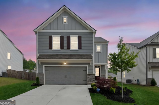 109 Grand Hickory Way, Dawsonville, GA 30534 - view of front of property featuring board and batten siding, concrete driveway, a garage, and brick siding