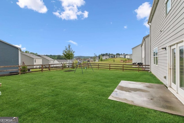 109 Grand Hickory Way, Dawsonville, GA 30534 - fenced backyard featuring a patio, a residential view, and a playground