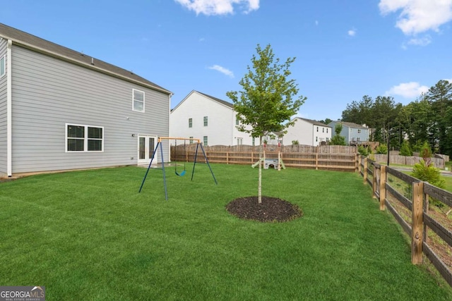 109 Grand Hickory Way, Dawsonville, GA 30534 - fenced backyard with a playground