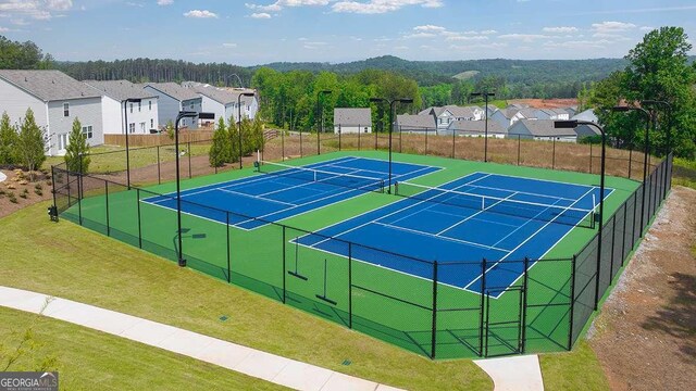 109 Grand Hickory Way, Dawsonville, GA 30534 - view of tennis court featuring a residential view and a view of trees