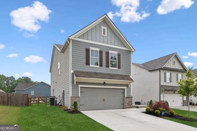 109 Grand Hickory Way, Dawsonville, GA 30534 - craftsman inspired home with board and batten siding, an attached garage, concrete driveway, brick siding, and a shingled roof