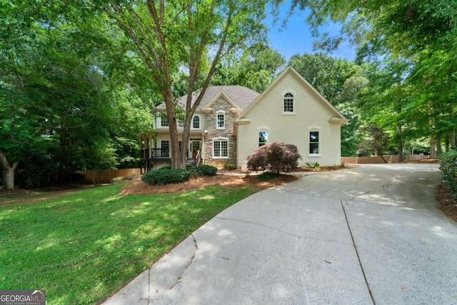 4544 Cavallon Way NW, Acworth, GA 30101 - view of front of property with stone siding, driveway, and stucco siding