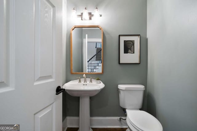 4544 Cavallon Way NW, Acworth, GA 30101 - half bathroom featuring toilet and baseboards