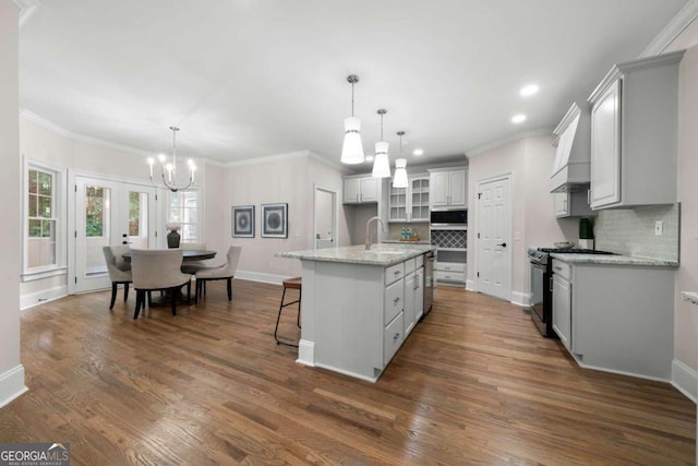 4544 Cavallon Way NW, Acworth, GA 30101 - kitchen featuring stainless steel appliances, decorative backsplash, a chandelier, recessed lighting, and dark wood-type flooring