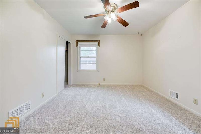 741 Greenhill Dr NE, Conyers, GA 30012 - carpeted empty room featuring ceiling fan and baseboards