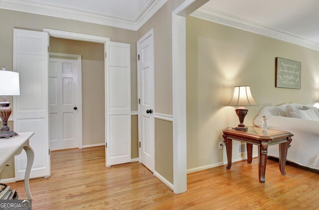 115 Shoal Creek Dr, Sharpsburg, GA 30277 - corridor featuring light wood-style floors and crown molding