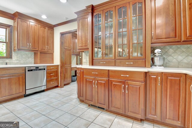 115 Shoal Creek Dr, Sharpsburg, GA 30277 - kitchen featuring stainless steel dishwasher, decorative backsplash, light countertops, recessed lighting, and crown molding