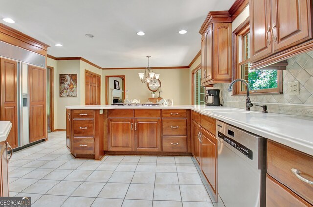 115 Shoal Creek Dr, Sharpsburg, GA 30277 - kitchen featuring stainless steel dishwasher, a peninsula, light countertops, brown cabinets, and crown molding