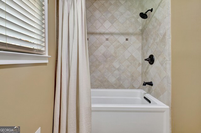 115 Shoal Creek Dr, Sharpsburg, GA 30277 - bathroom with shower / tub combo with curtain