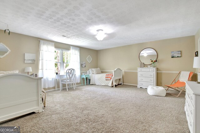 115 Shoal Creek Dr, Sharpsburg, GA 30277 - carpeted bedroom with a textured ceiling