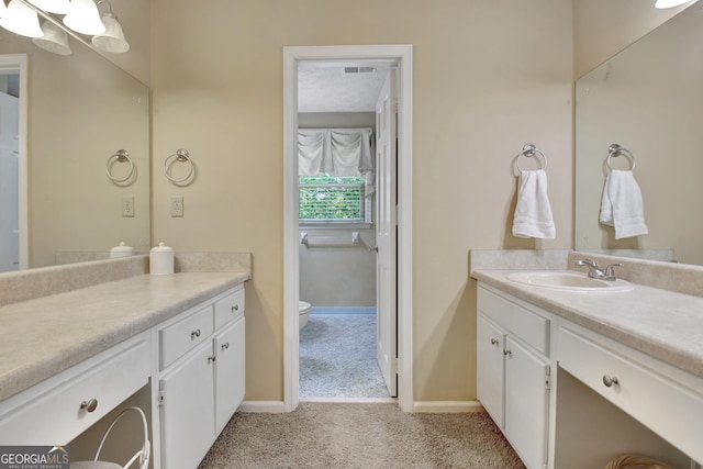 115 Shoal Creek Dr, Sharpsburg, GA 30277 - bathroom with vanity and toilet