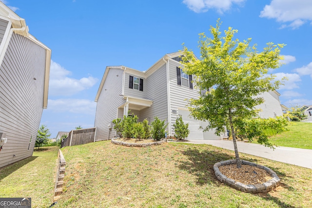 3350 Clawing Hawk Way, Douglasville, GA 30135 - view of property exterior featuring an attached garage and driveway