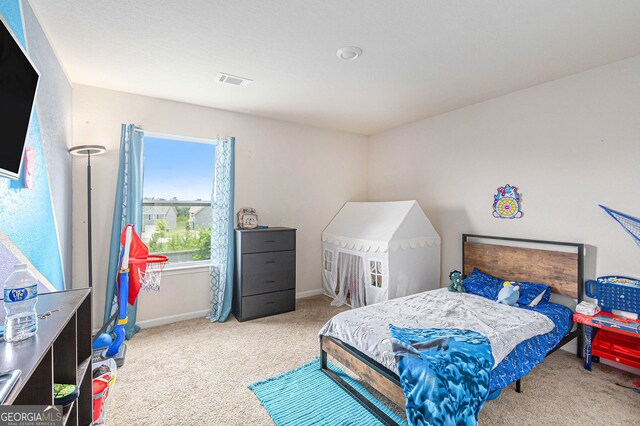 3350 Clawing Hawk Way, Douglasville, GA 30135 - carpeted bedroom featuring baseboards