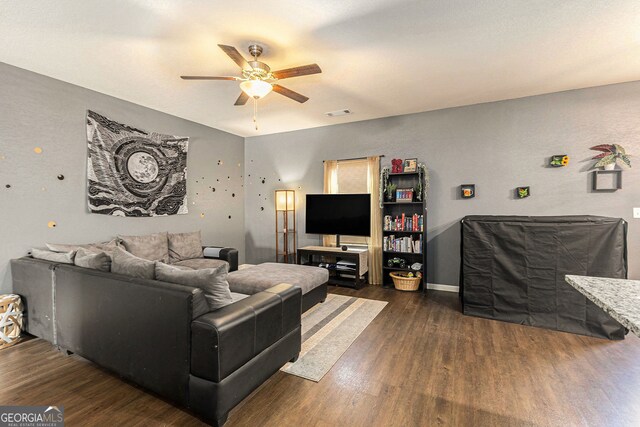 3350 Clawing Hawk Way, Douglasville, GA 30135 - living area featuring a ceiling fan and wood finished floors