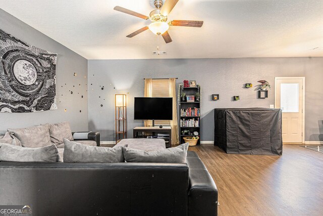 3350 Clawing Hawk Way, Douglasville, GA 30135 - living area with wood finished floors and ceiling fan