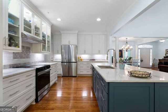 17 Shotgun Rd NW, Cartersville, GA 30121 - kitchen featuring freestanding refrigerator, electric range oven, under cabinet range hood, white cabinetry, and a chandelier