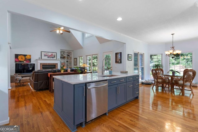 17 Shotgun Rd NW, Cartersville, GA 30121 - kitchen featuring stainless steel dishwasher, a chandelier, light wood-type flooring, a fireplace, and recessed lighting