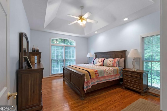 17 Shotgun Rd NW, Cartersville, GA 30121 - bedroom featuring a raised ceiling, wood finished floors, recessed lighting, and a ceiling fan