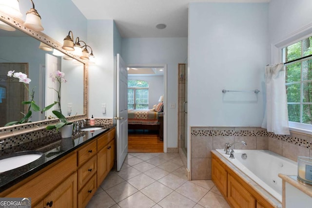 17 Shotgun Rd NW, Cartersville, GA 30121 - ensuite bathroom featuring double vanity, plenty of natural light, and a bath