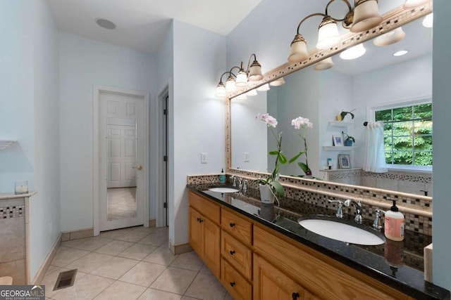 17 Shotgun Rd NW, Cartersville, GA 30121 - bathroom featuring double vanity, tasteful backsplash, and tile patterned flooring