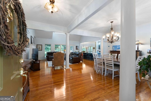 17 Shotgun Rd NW, Cartersville, GA 30121 - dining area featuring ornate columns, a chandelier, crown molding, and wood finished floors