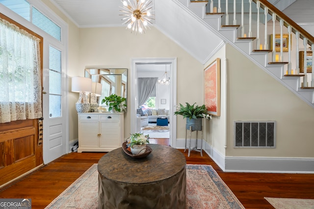 514 S Jefferson St, Washington, GA 30673 - entryway with a chandelier, stairway, healthy amount of natural light, dark wood-style floors, and ornamental molding
