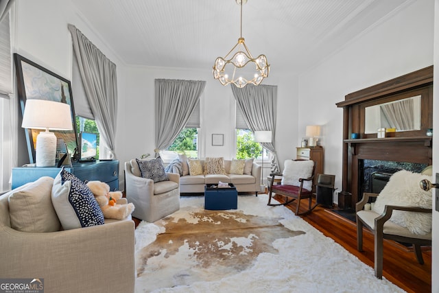 514 S Jefferson St, Washington, GA 30673 - living area featuring a chandelier, ornamental molding, and wood finished floors