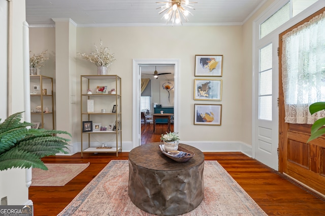 514 S Jefferson St, Washington, GA 30673 - entrance foyer with crown molding, dark wood-style flooring, and a chandelier