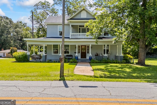 514 S Jefferson St, Washington, GA 30673 - view of front of house with a porch and a front yard