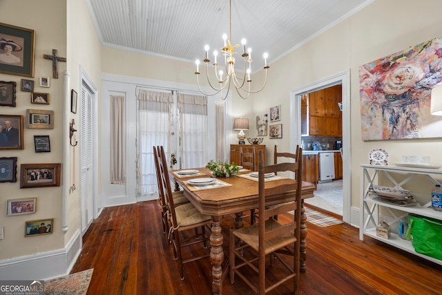 514 S Jefferson St, Washington, GA 30673 - dining room featuring crown molding, a chandelier, and dark wood-style flooring