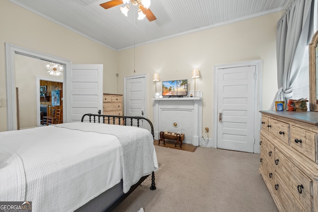 514 S Jefferson St, Washington, GA 30673 - bedroom featuring light carpet, vaulted ceiling, ornamental molding, and a ceiling fan