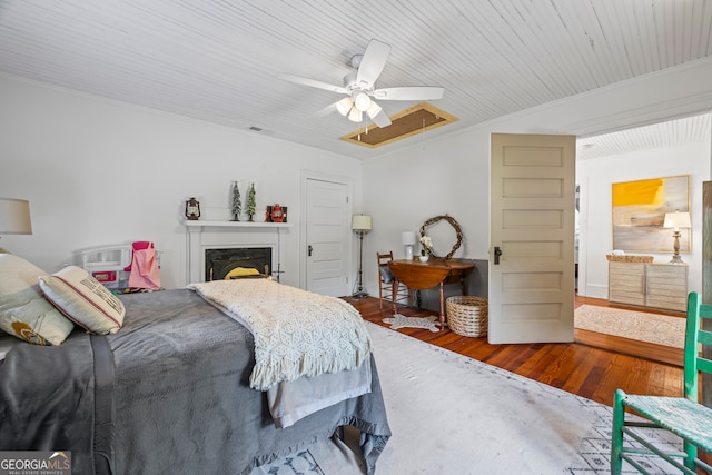 514 S Jefferson St, Washington, GA 30673 - bedroom with attic access, wood finished floors, crown molding, ceiling fan, and wooden ceiling