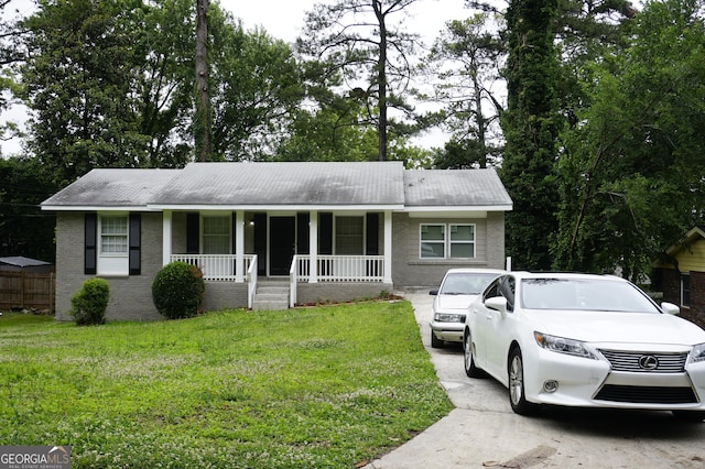 39 Mcferrin Cir, Riverdale, GA 30274 - ranch-style house with a porch, brick siding, and a front yard