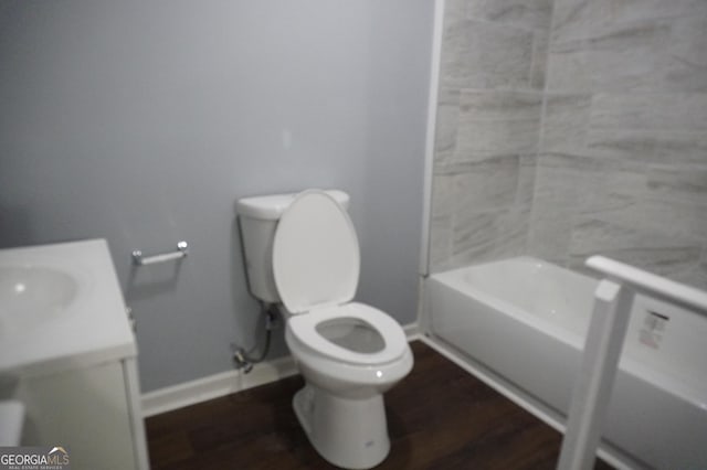 39 Mcferrin Cir, Riverdale, GA 30274 - full bath featuring vanity, wood finished floors, and shower / bathtub combination