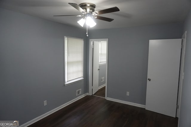 39 Mcferrin Cir, Riverdale, GA 30274 - unfurnished bedroom with dark wood-type flooring and ceiling fan