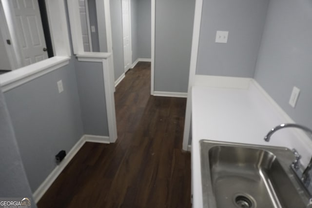 39 Mcferrin Cir, Riverdale, GA 30274 - laundry room with a sink and dark wood-style floors