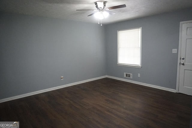 39 Mcferrin Cir, Riverdale, GA 30274 - unfurnished room featuring dark wood-type flooring, ceiling fan, and a textured ceiling